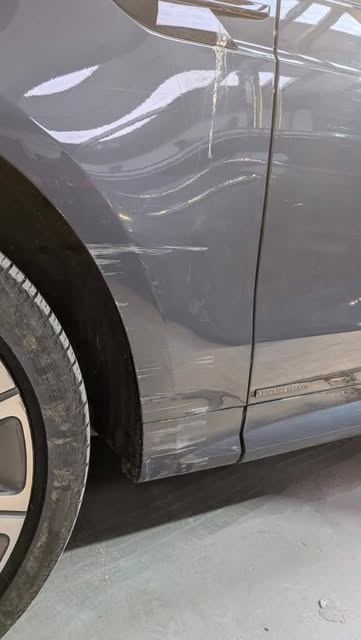 Grey car door and sill after painting